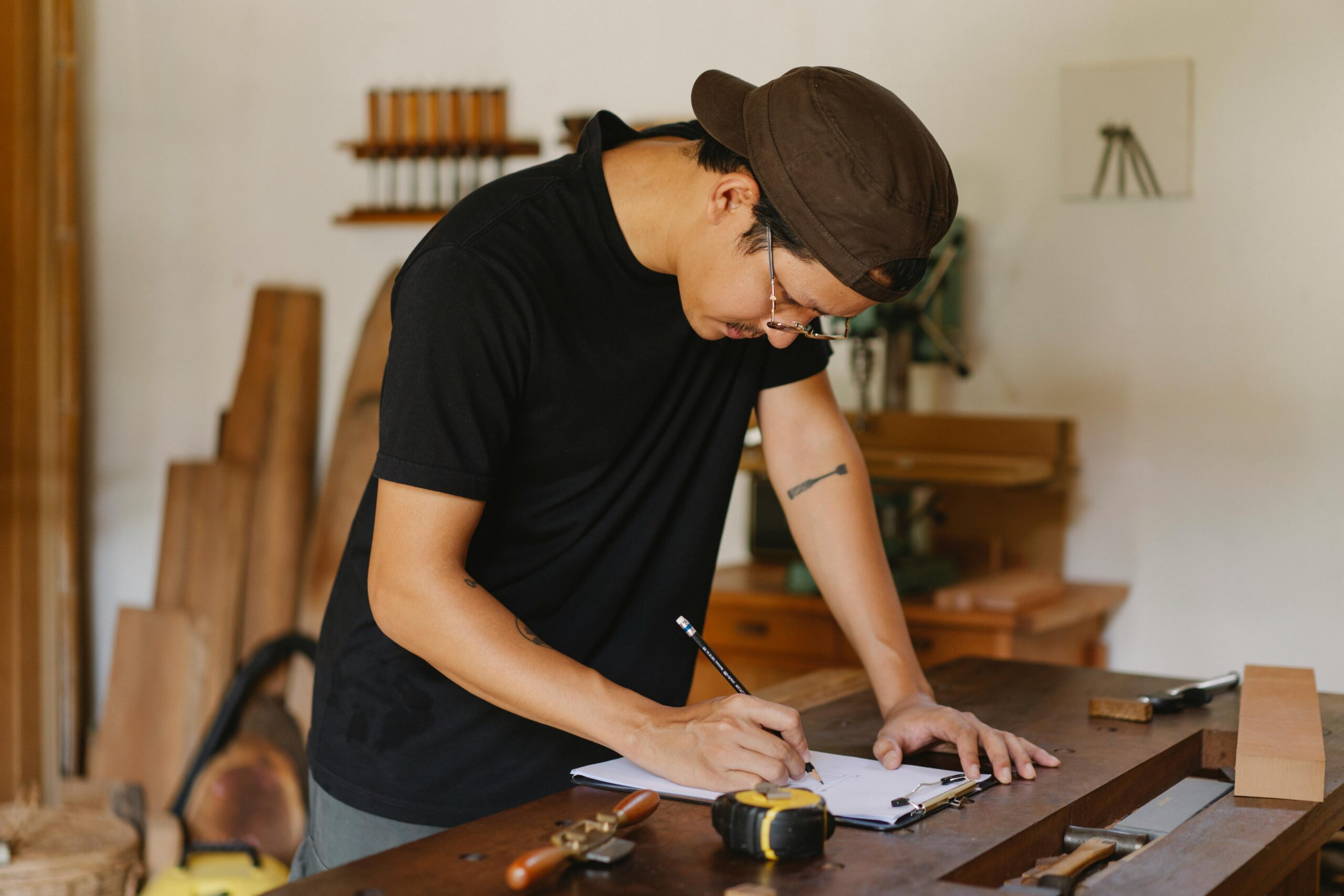 Man sketching in workshop